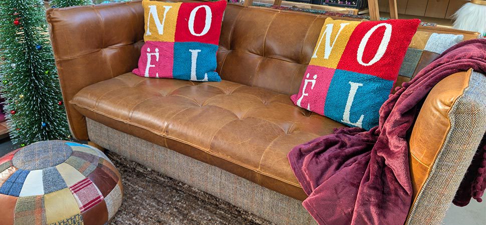 colourful christmas theme noel pillows on sofa 970w