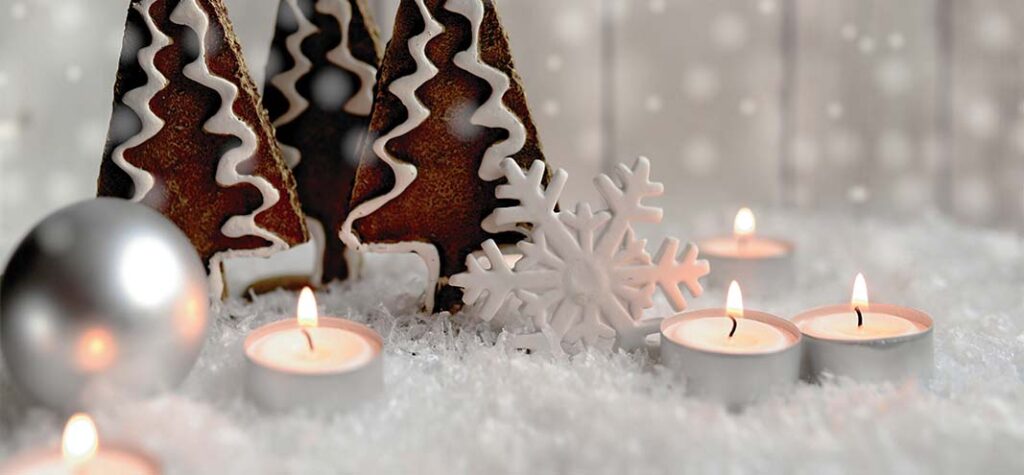 white christmas theme gingerbread trees and tealight candles